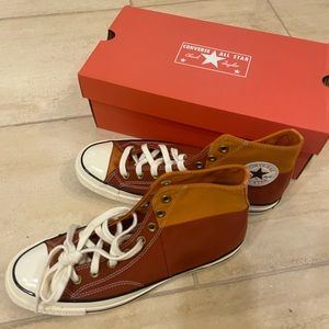 Converse Chuck Taylor high tops NEW. Mens 8.5 women’s 10.5.
Retail $99. Sale $49
